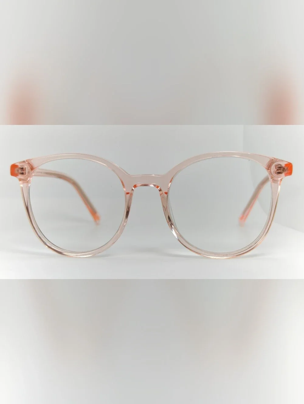 Noun. Transparent Pink Round Women's Eyeglasses. Minimalist..